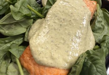 Creamy Pesto Salmon over Spinach